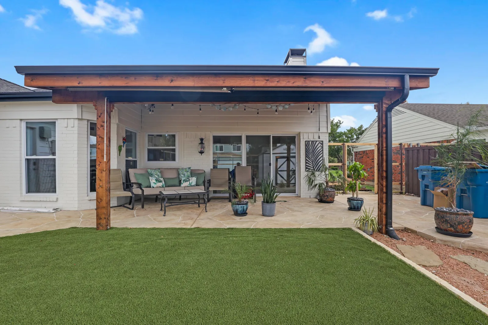After: covered patio with cedar posts