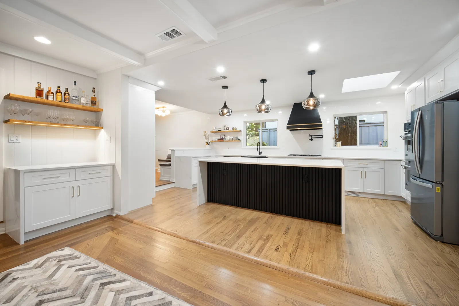 After: kitchen island pendants and bar