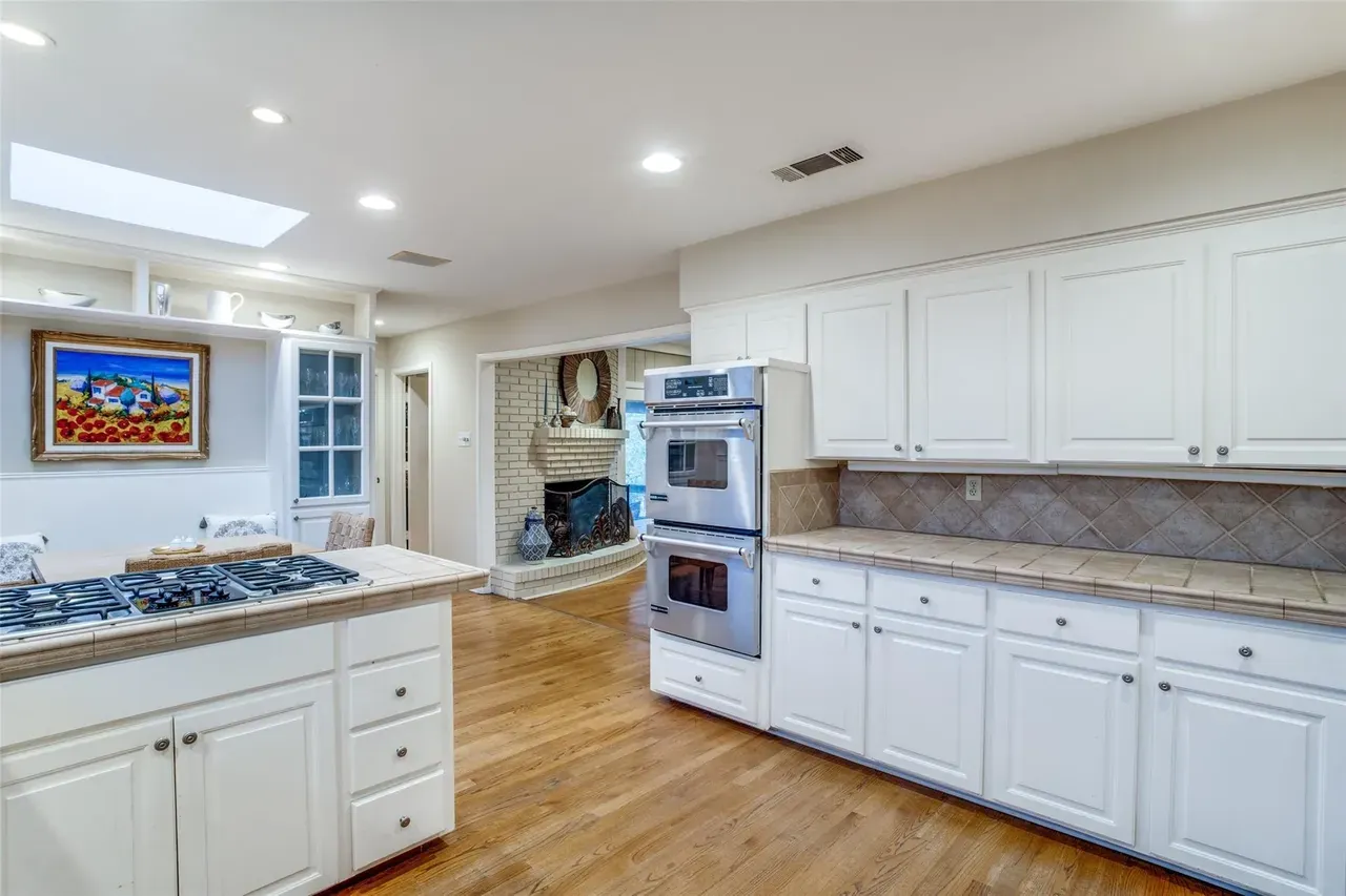 Before: kitchen oven wall and fireplace