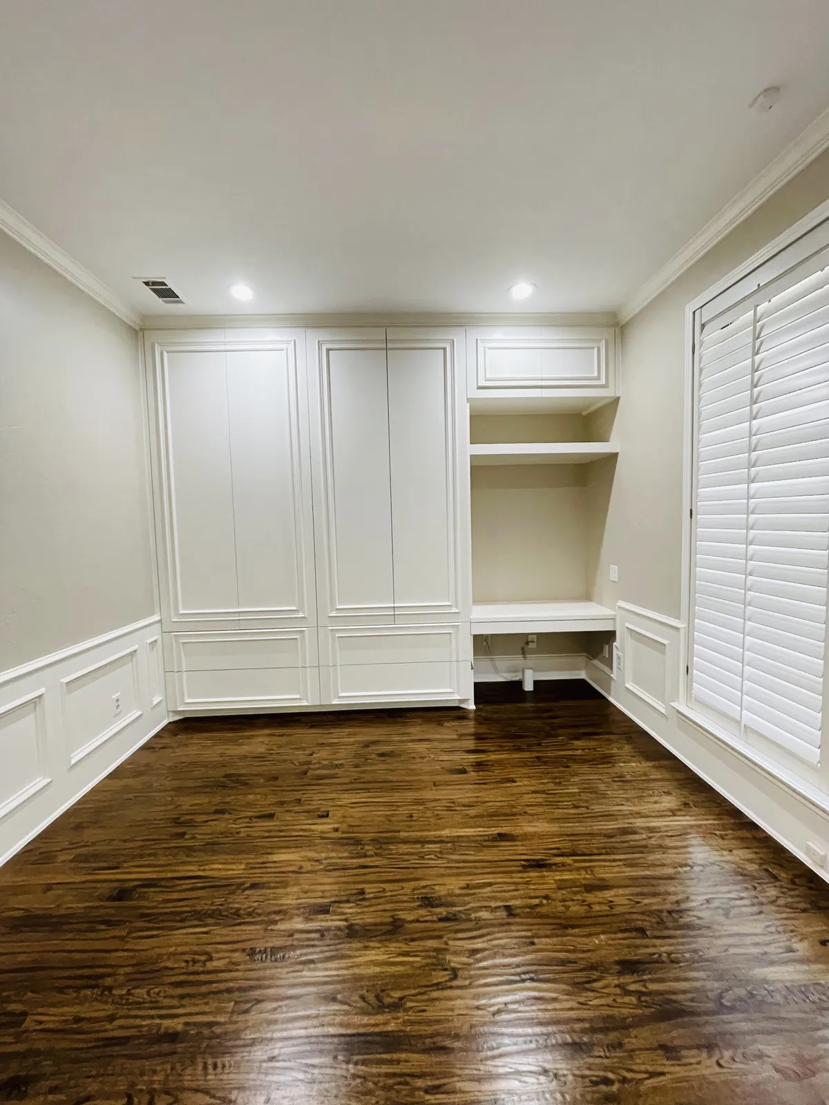 After: wardrobe wall and desk nook with shutters