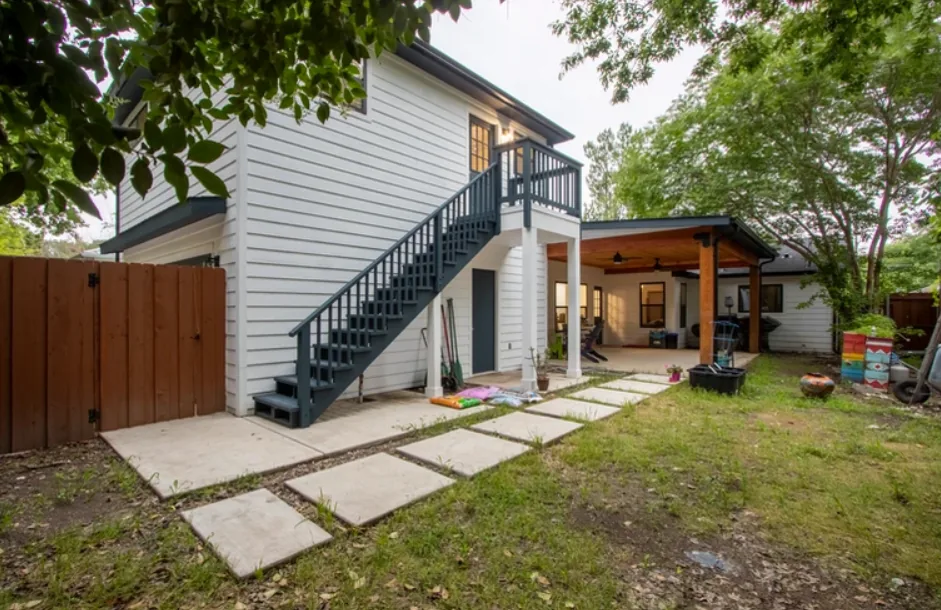 After: backyard stairs and covered patio