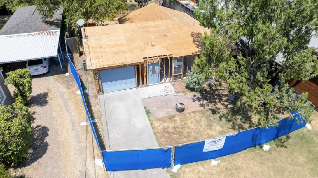 Demo: aerial roof decking and garage front
