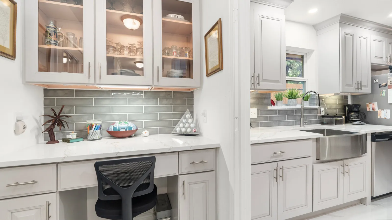 After: desk nook and glass front cabinets