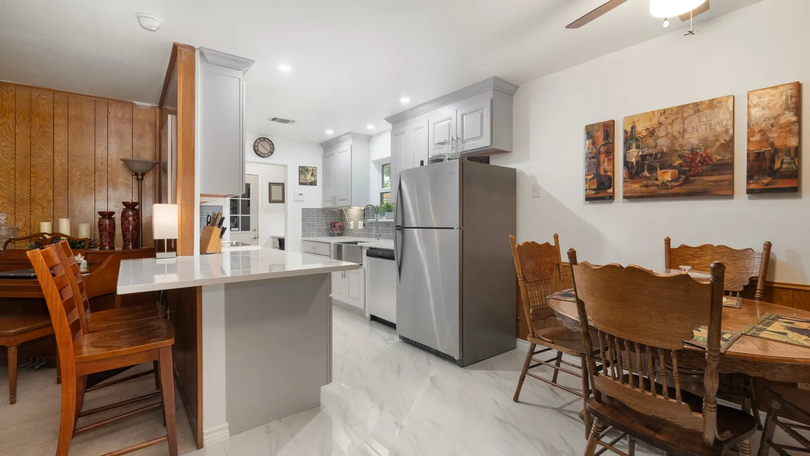 After: kitchen peninsula and dining area