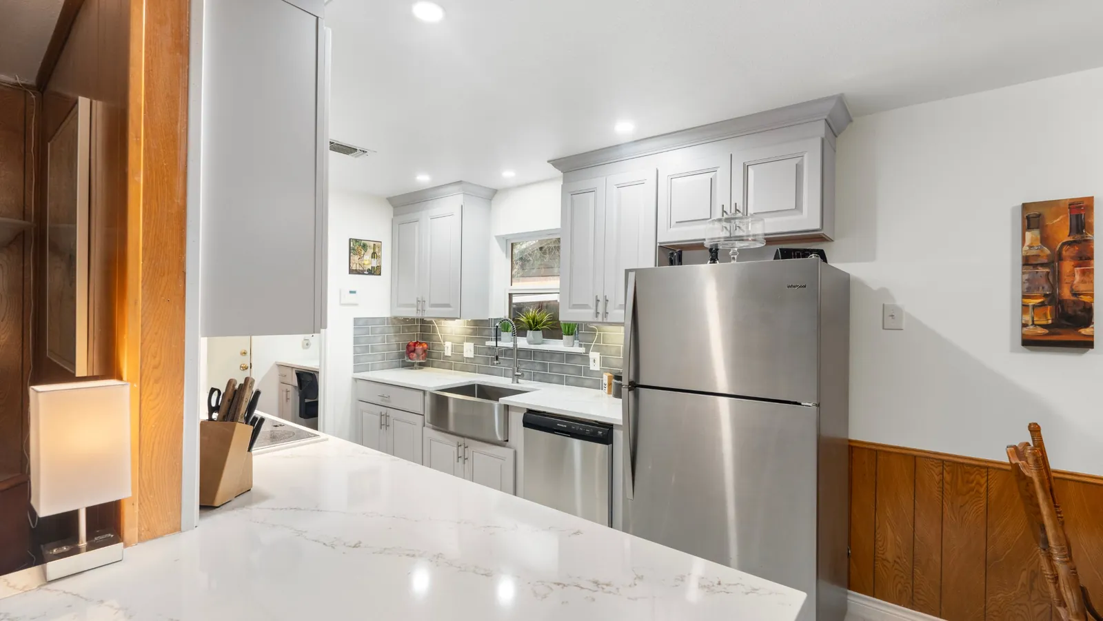 After: sink wall and peninsula counter