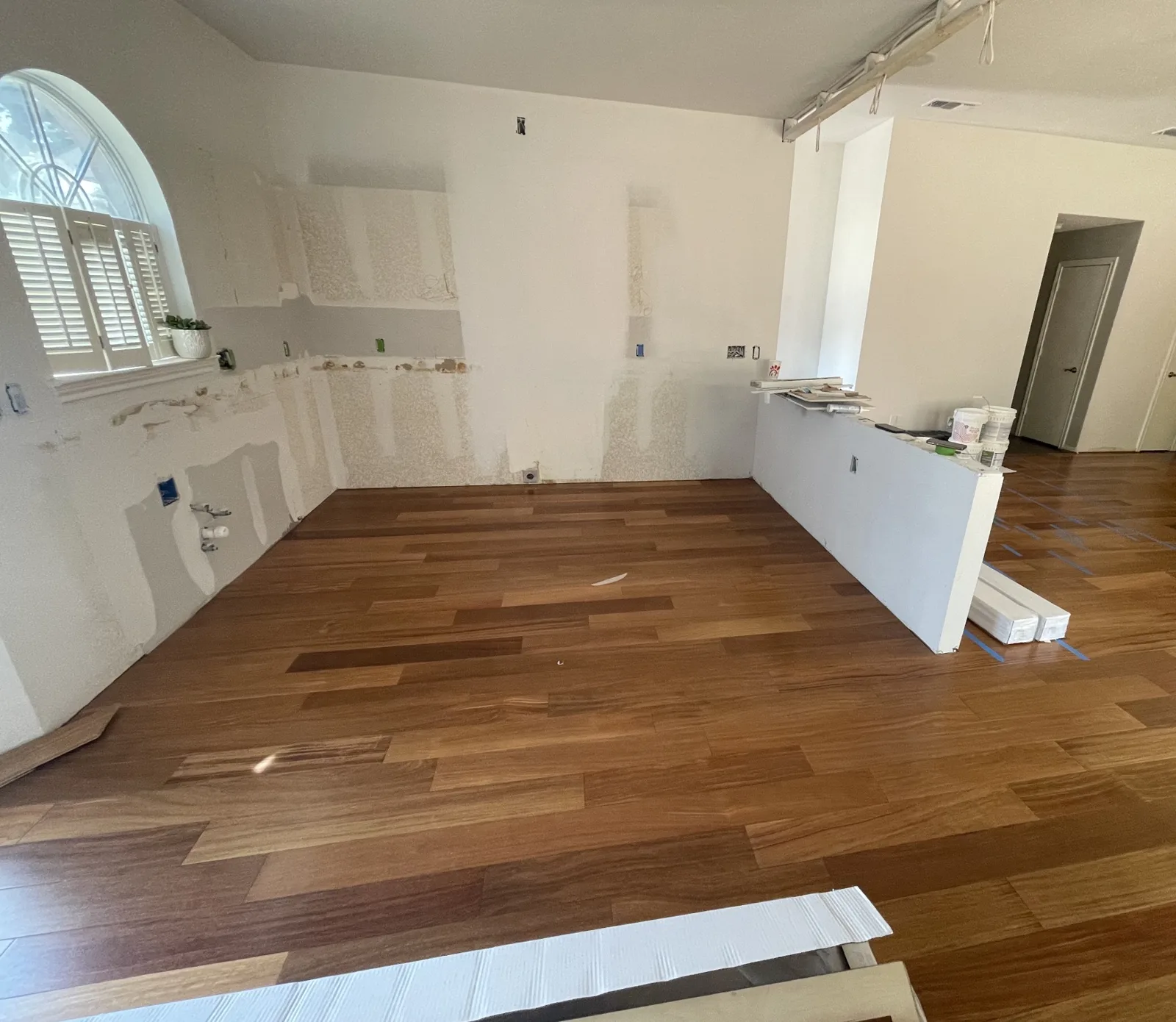 During: new hardwood floor going in