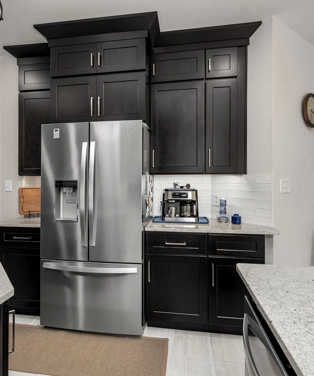 After: fridge wall espresso cabinets to ceiling