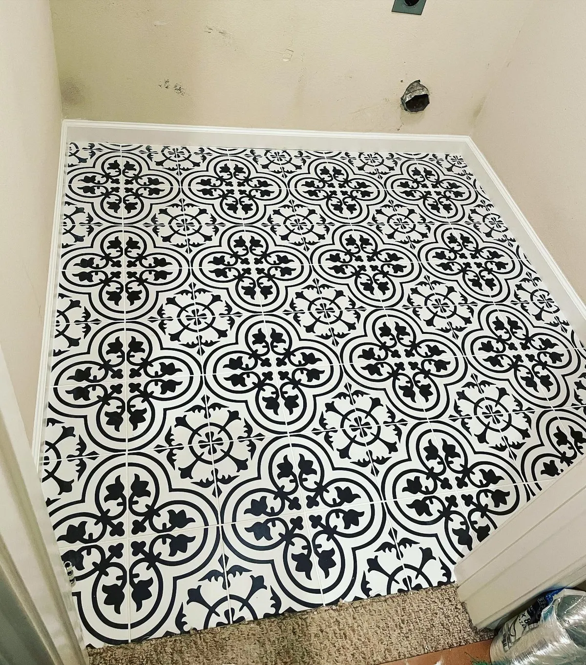After: laundry room patterned tile floor