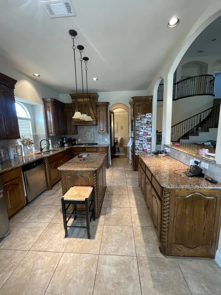 Before: kitchen island and arches