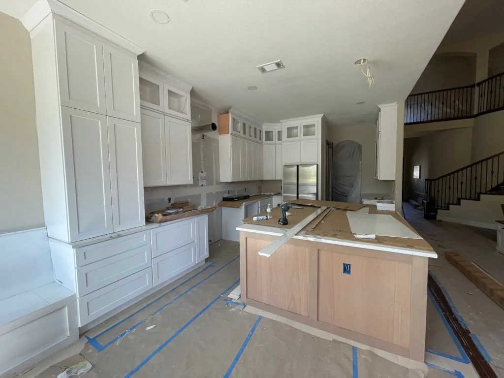 During: new cabinets and island framed